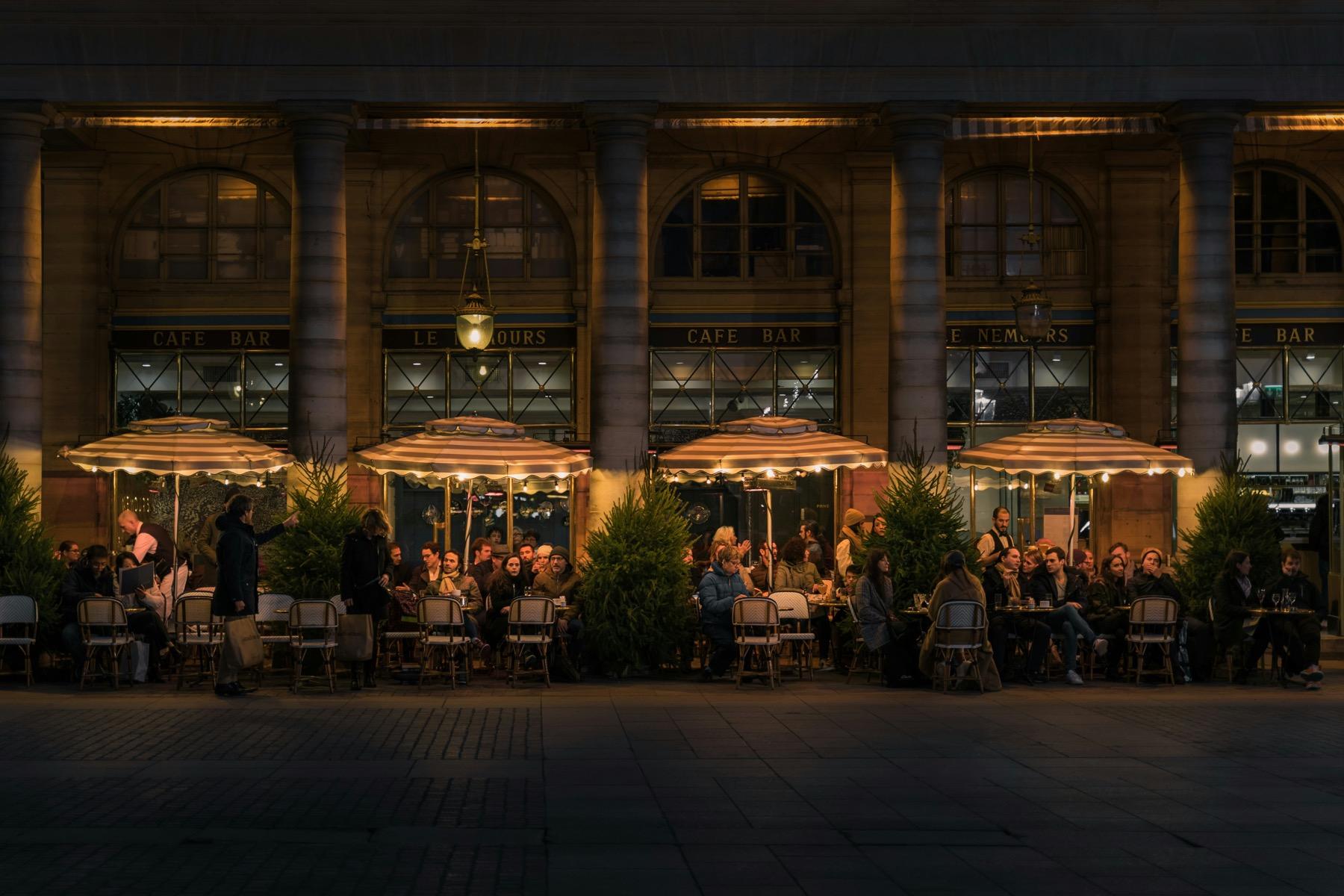 Illuminated restaurant and retail commercial site at night
